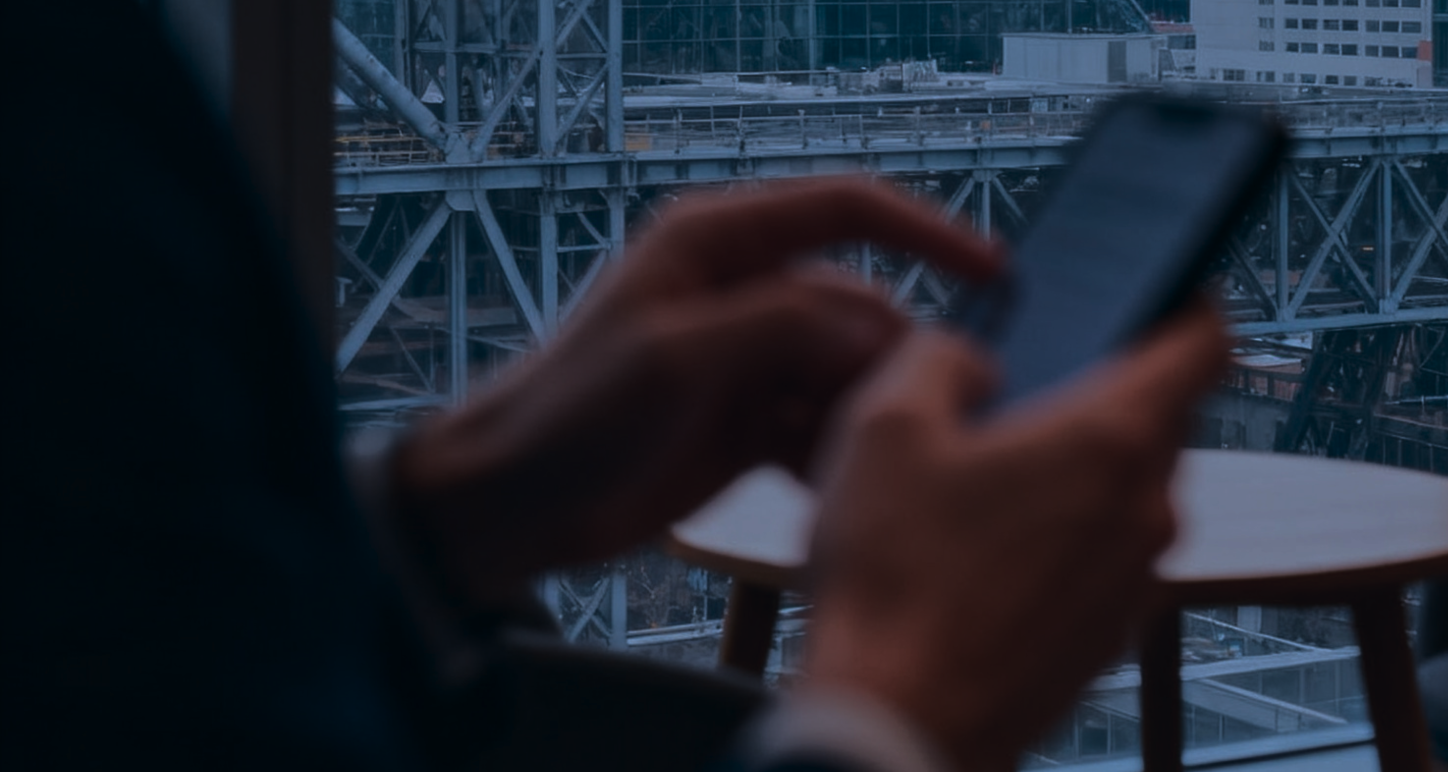 A business traveller checking a payment on their phone